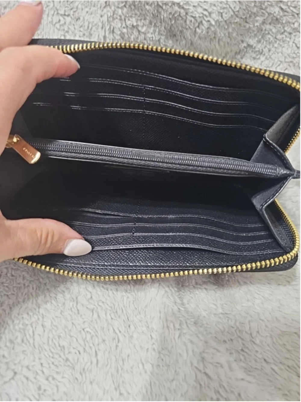 Coach this zip
